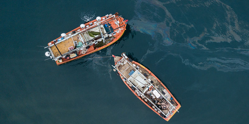 two vessels in oil spill