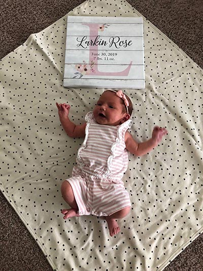 Chris Koepfer and his wife, Traci, welcomed a baby girl – Larkin Rose Koepfer