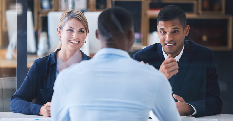 Agent meeting with two clients